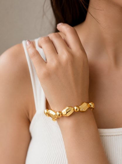 Golden Sculpted Bead Stretchable Bracelet